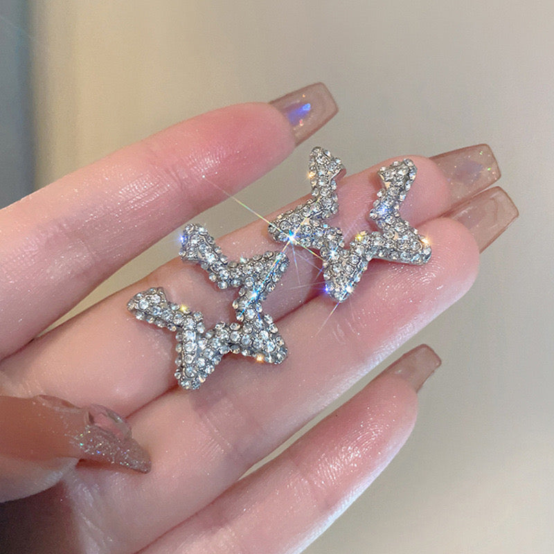 E4590 Aretes estrella plateada cristal brillante aleacion 1.7cm