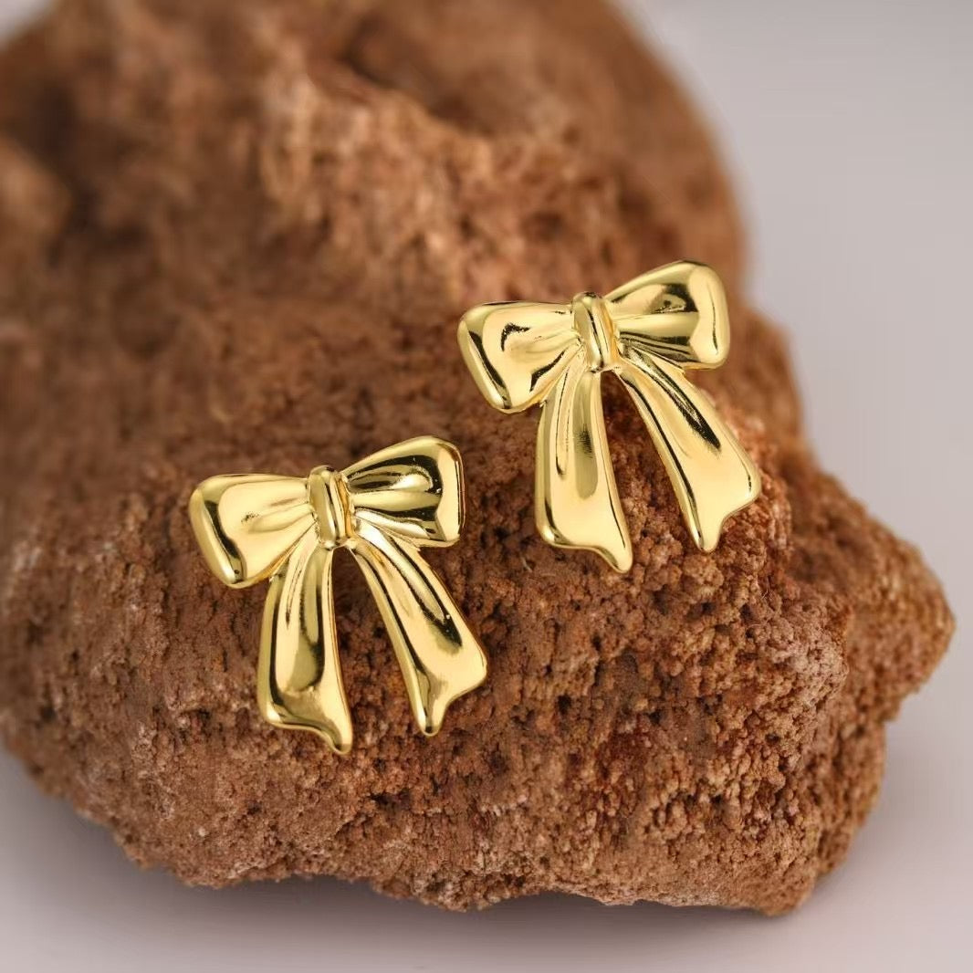 J573 Aretes moños dorados acero inoxidable chapado en oro de 18k 3cm
