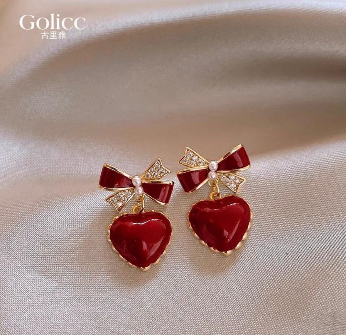E5079 Aretes corazón guinda moño aleacion 2cm