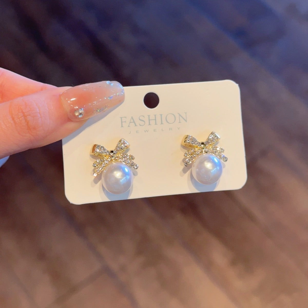 E2251 Aretes moño zirconia perla 2cm