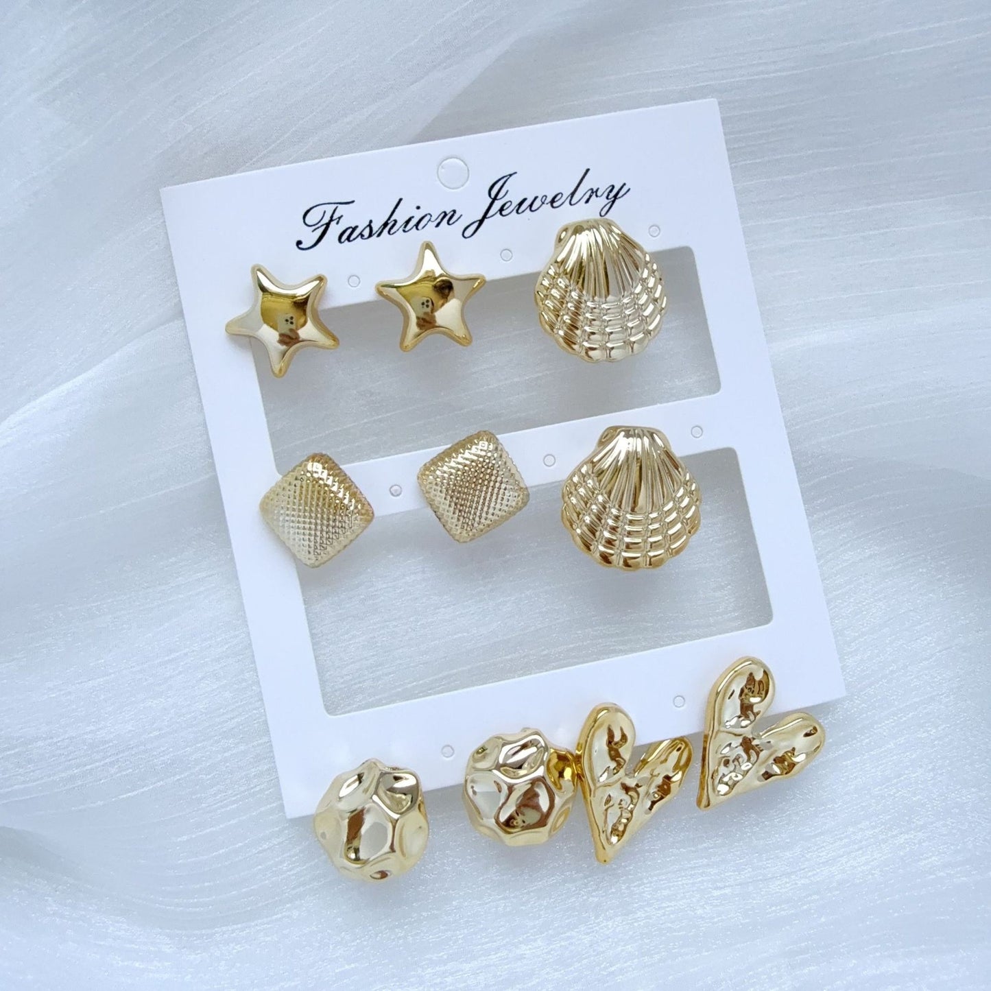 E6083 Conjunto Aretes dorados 3cm aleacion