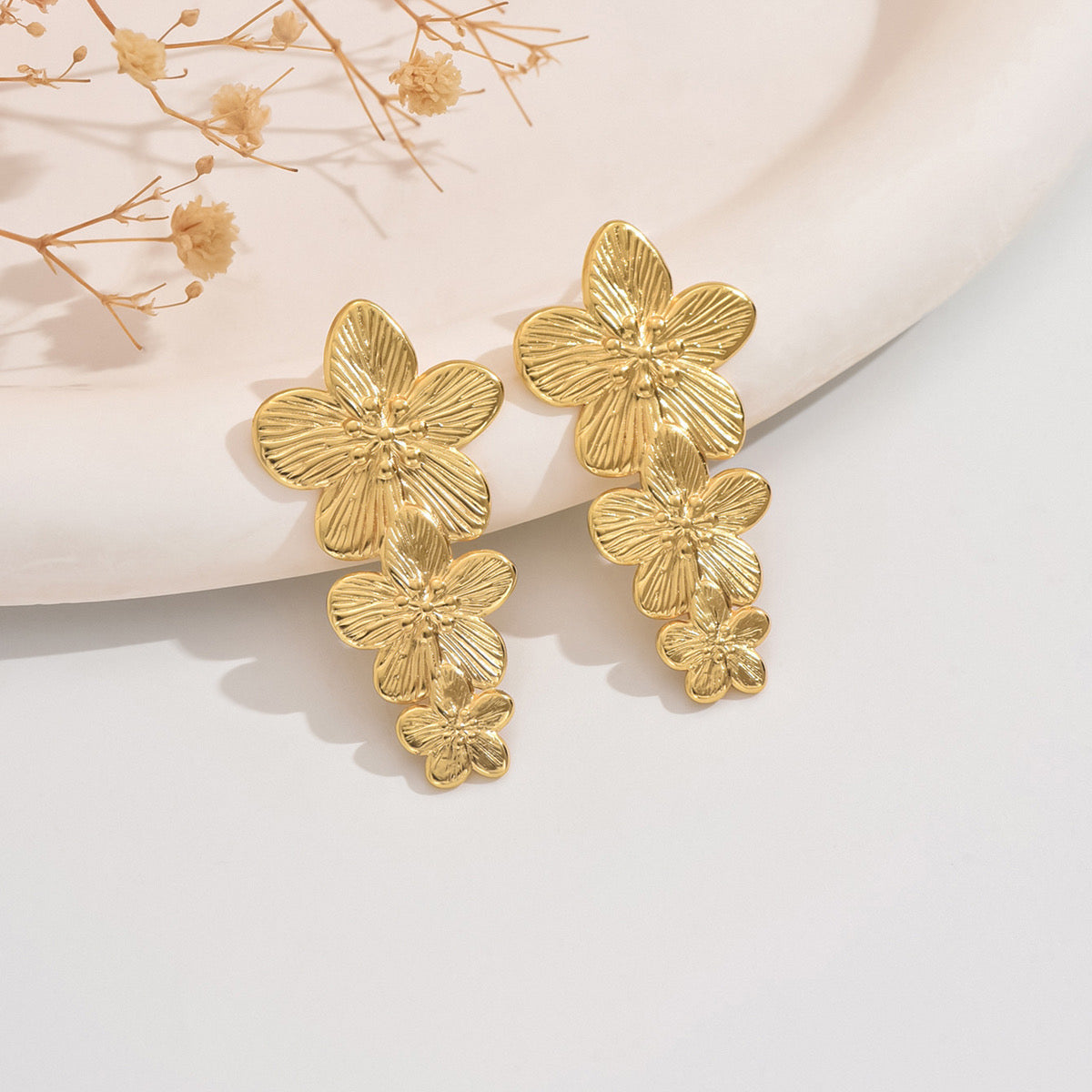 E2548 Aretes flores acero inoxidable 4cm