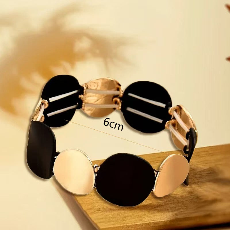 B409 Brazalete negro y dorado aleacion elástico