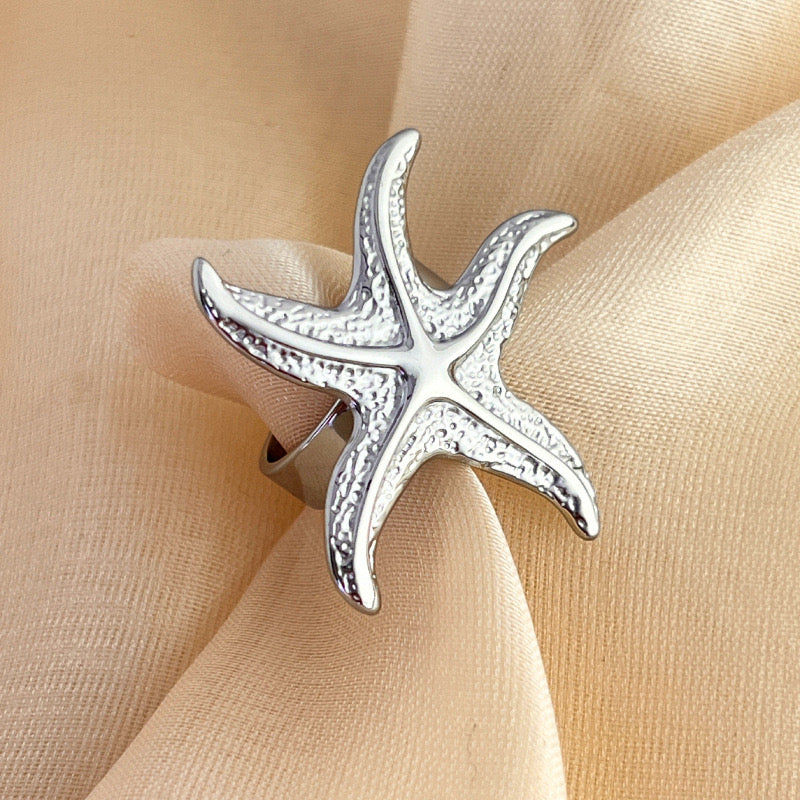 A163 Anillo estrella de mar plateada aleacion 3.5cm