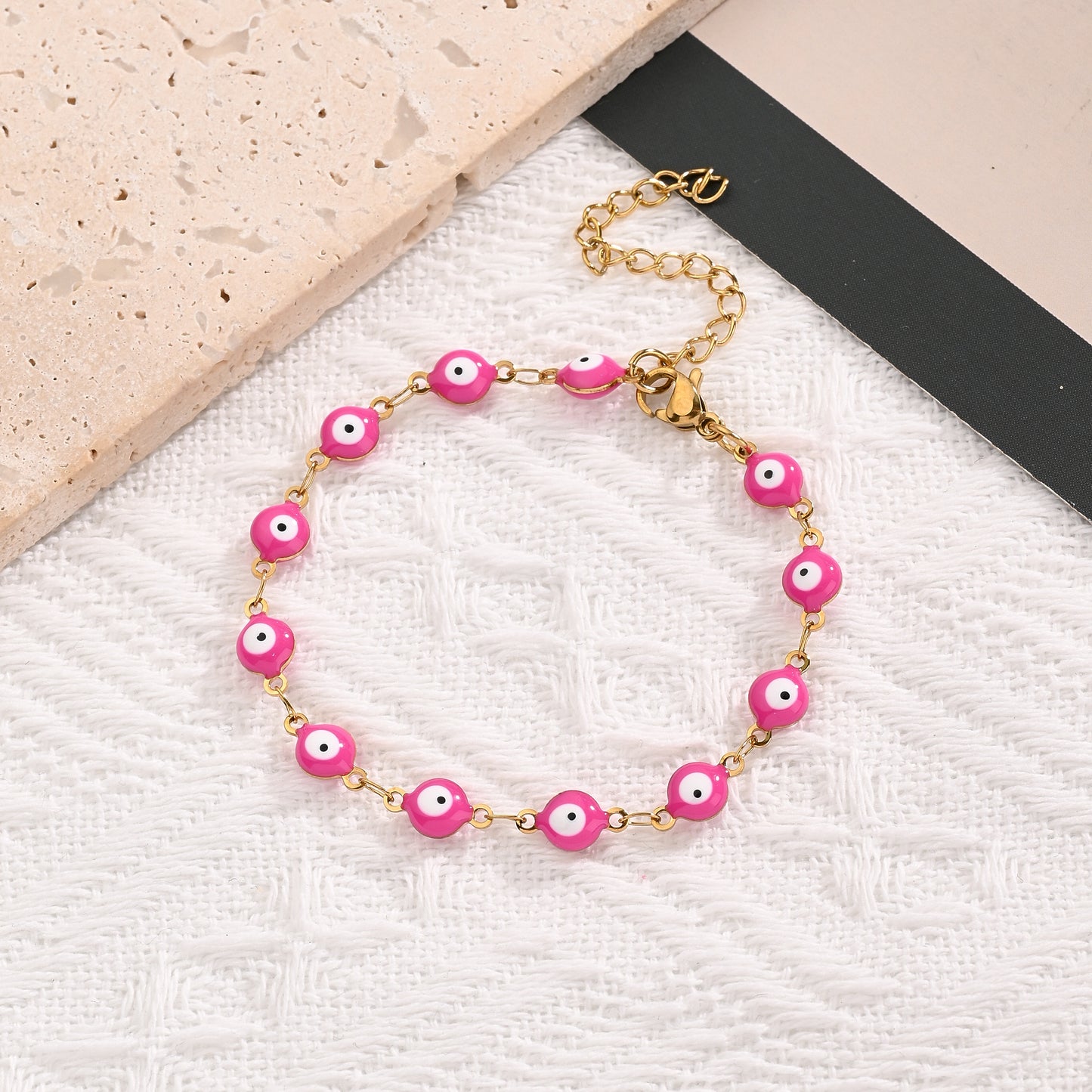 B384 Pulsera ojo turco rosa acero inoxidable chapado en oro 18k 19cm
