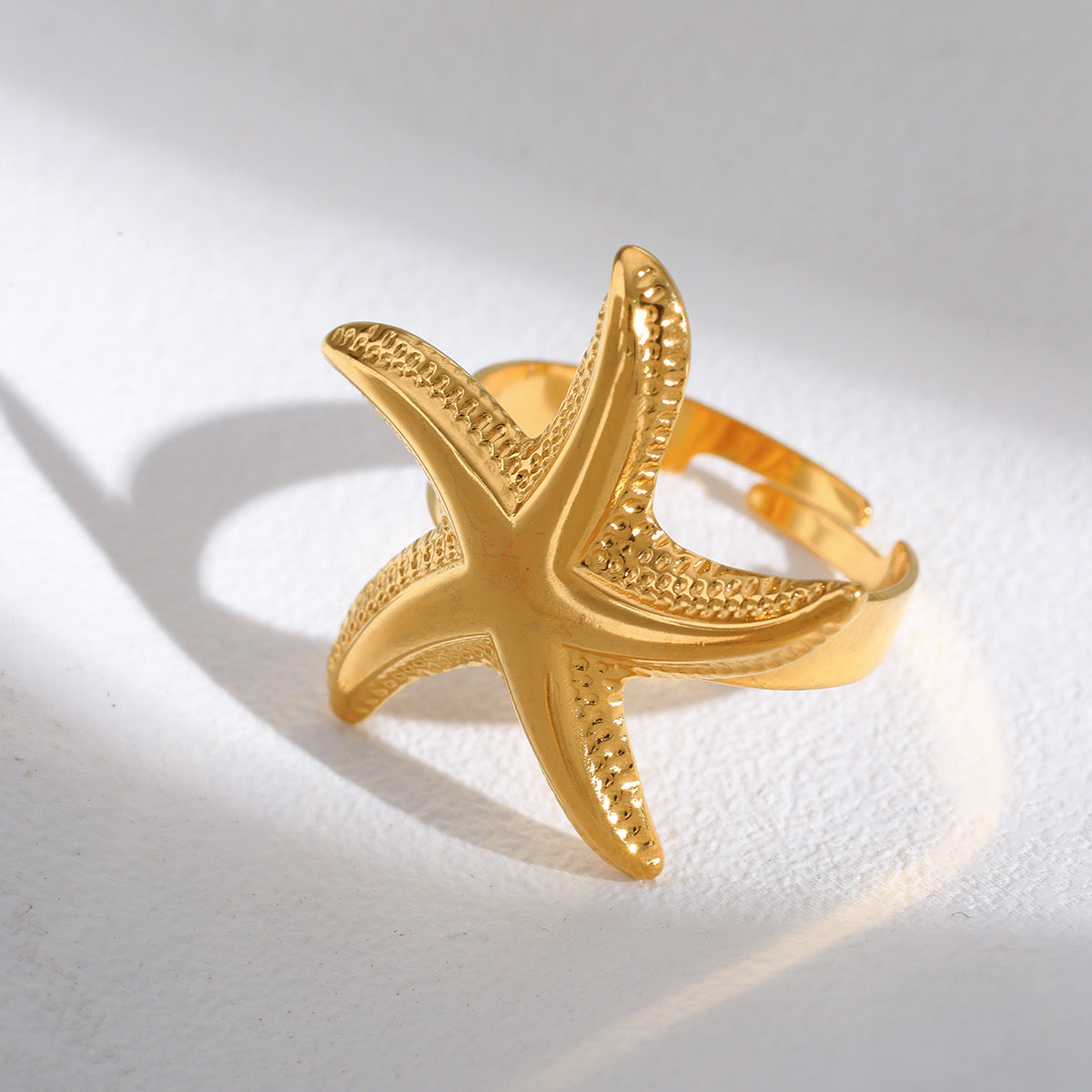 A168 Anillo abierto dorado estrella de mar acero inoxidable chapado en oro 18k 2cm