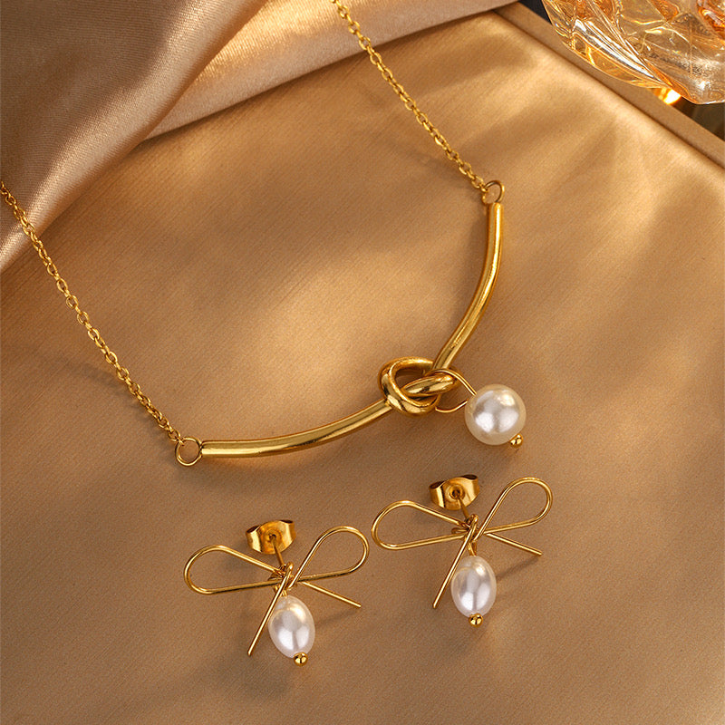 C797 Conjunto collar y aretes perla acero inoxidable chapado en oro de 18k 22cm largo 2.5dije