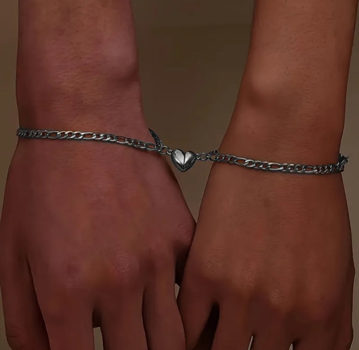 B366 Duo pulseras plateadas corazon magnetizado pareja acero de titanio