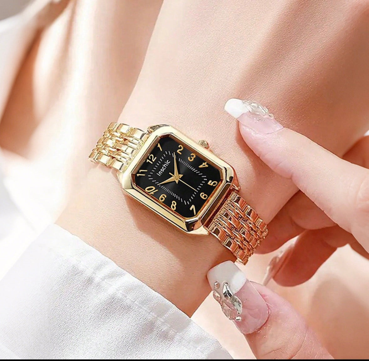 R184 reloj dorado negro casual hebilla de cuarzo de mujer