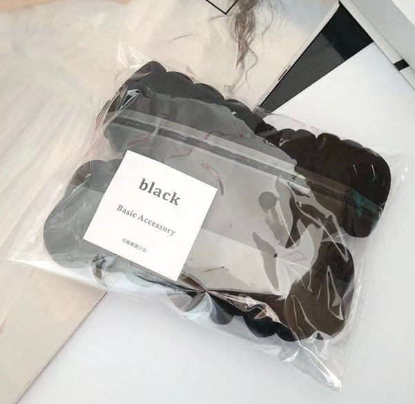 AC78N Paquete ligas negras elasticas incluye 50piezas