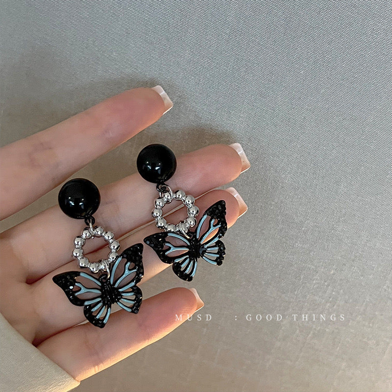 E3612 Aretes mariposa negra aleacion 4cm