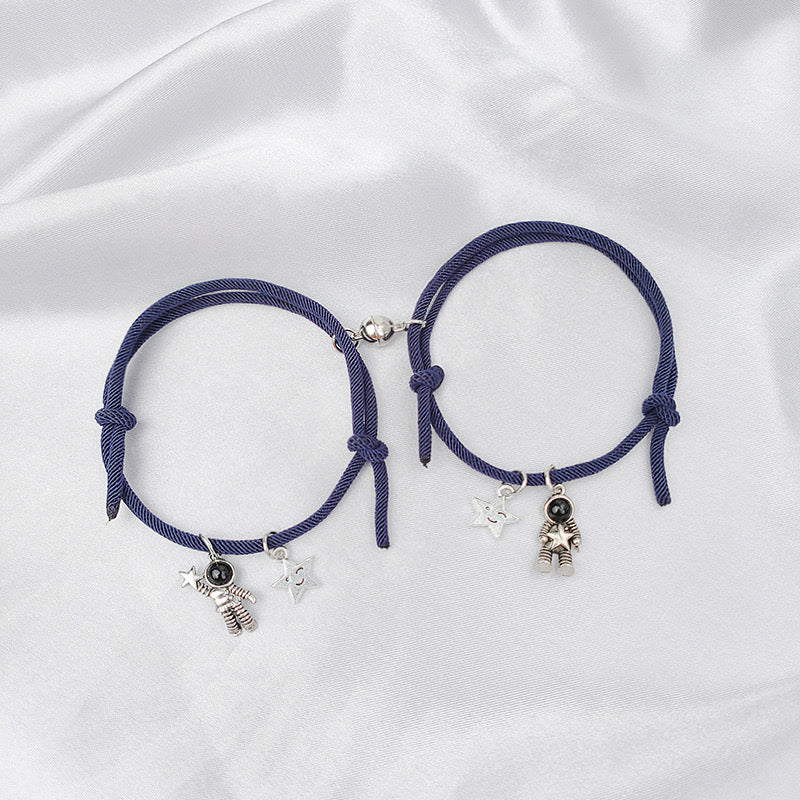B431A Pulsera dúo astronauta pareja