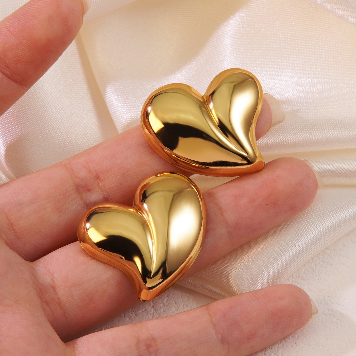 E2426 Aretes corazon acero inoxidable liso 2.3cm