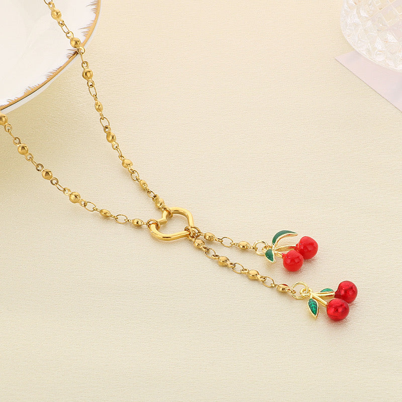 C828 collar cerezas acero inoxidable chapado en oro de 18k 24cm largo 5.5cm dije