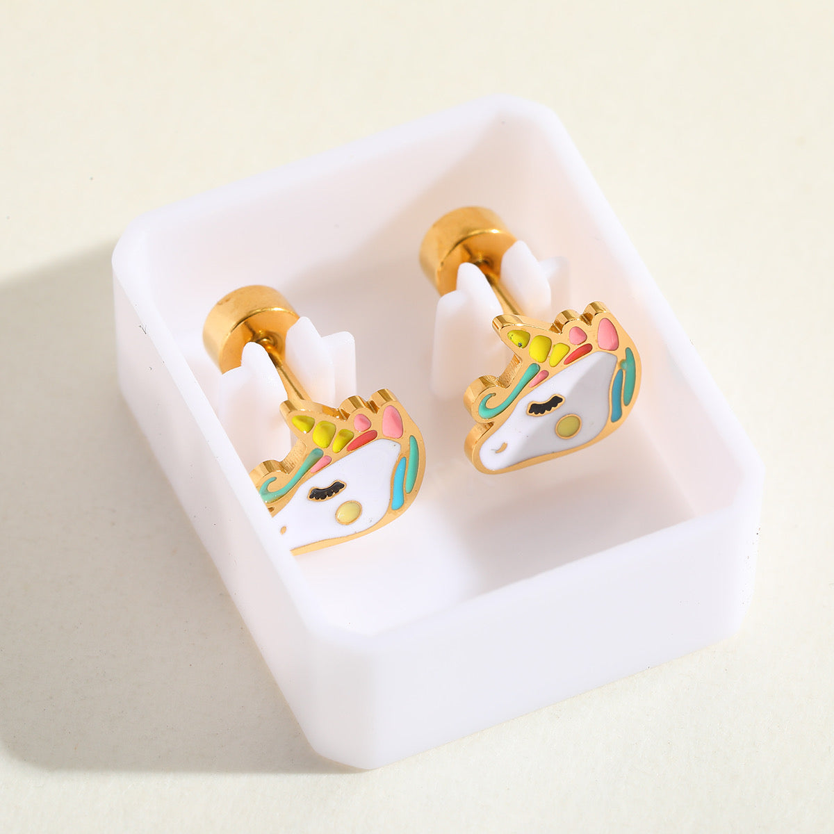 E4686 Aretes unicornio acero inoxidable 1cm