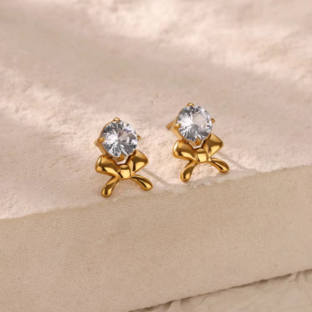 E3443 Aretes moño cristal acero inoxidable 1.5cm