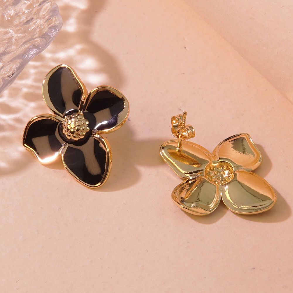 J412 Aretes flor negra acero inoxidable