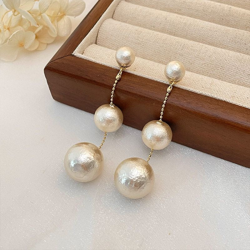 E3872 Aretes colgantes perlas 6.5cm