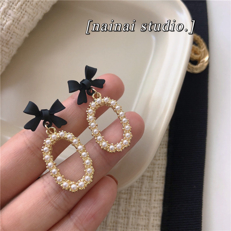 E2845 Aretes Moño perlas aleacion 3.5cm