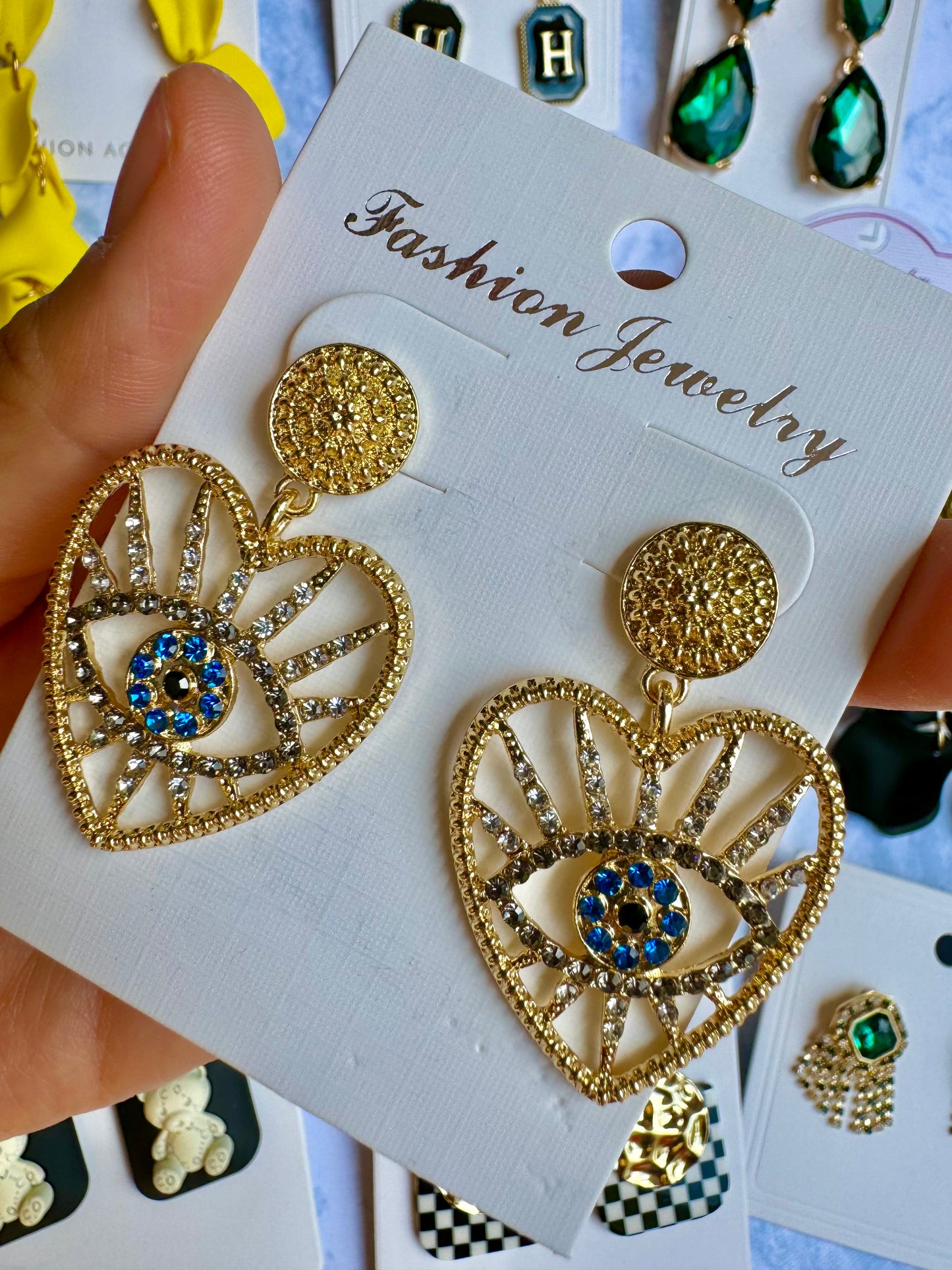 E1670 Aretes corazón ojo enchapado zirconia