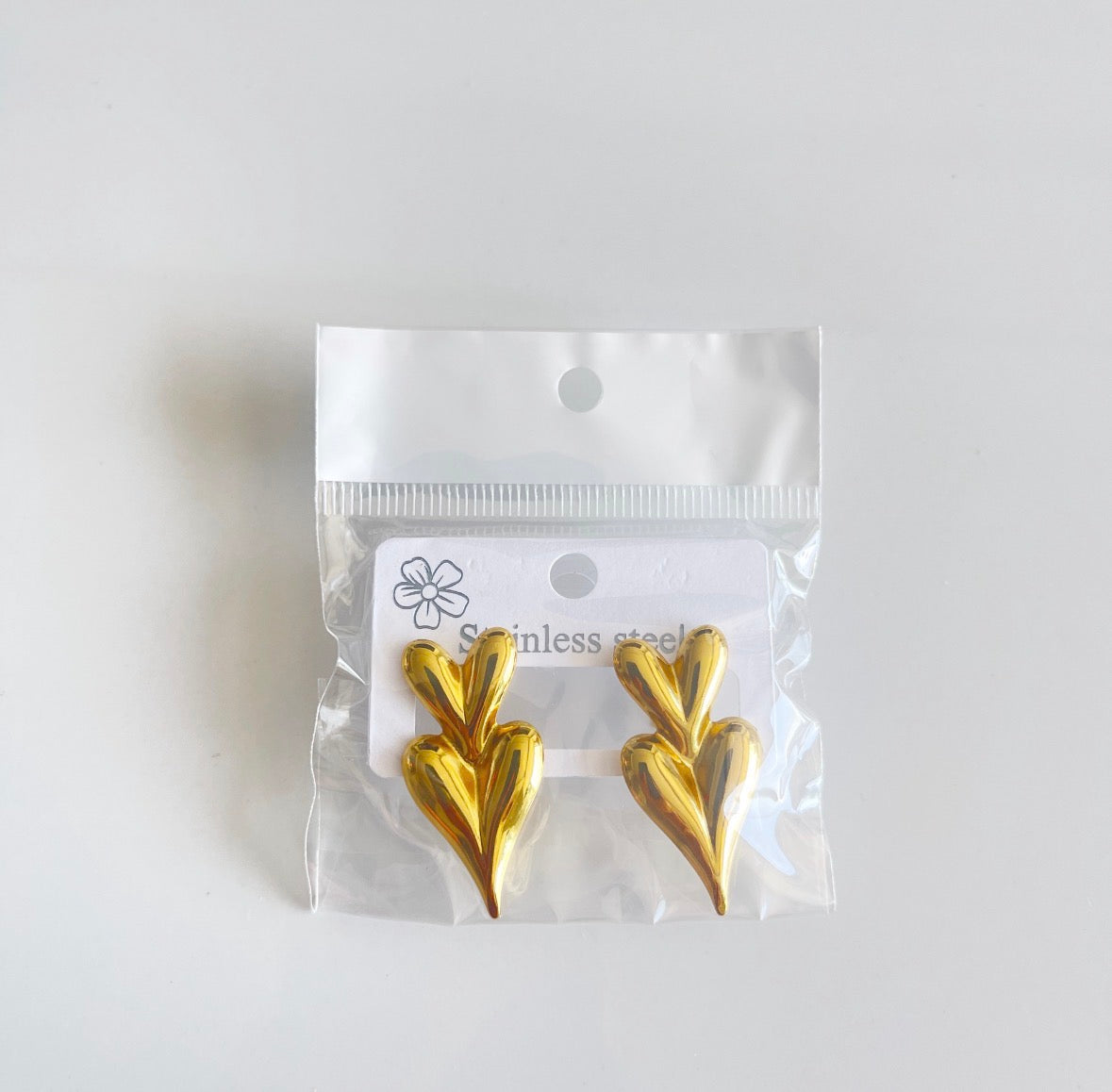 E5100 Aretes doble corazón dorado acero inoxidable 3cm