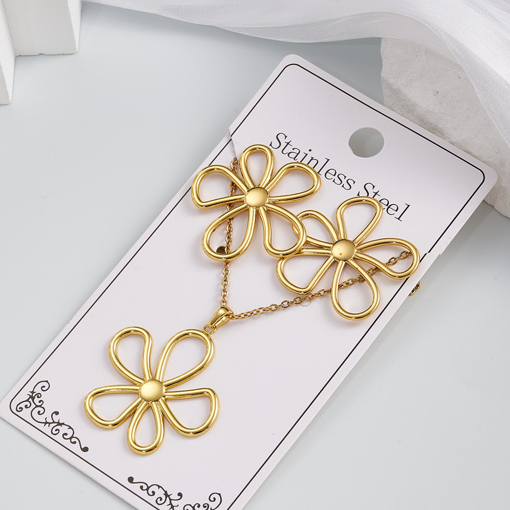 C892 Conjunto de artes y collar flor dorada acero inoxidable 20cm largo 3.5cm dije 3.5aretes