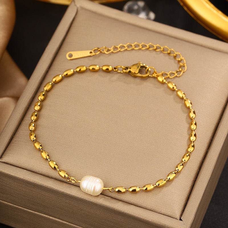 B292 Pulsera perla acero inoxidable chapado en oro 18k 21cm