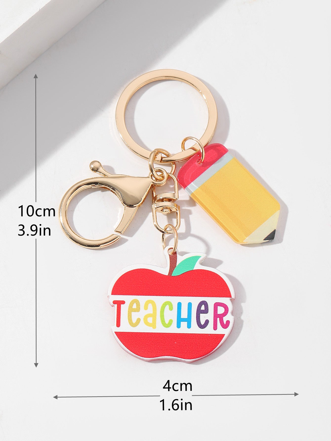 K91 llavero manzana teacher acrílico 10cm