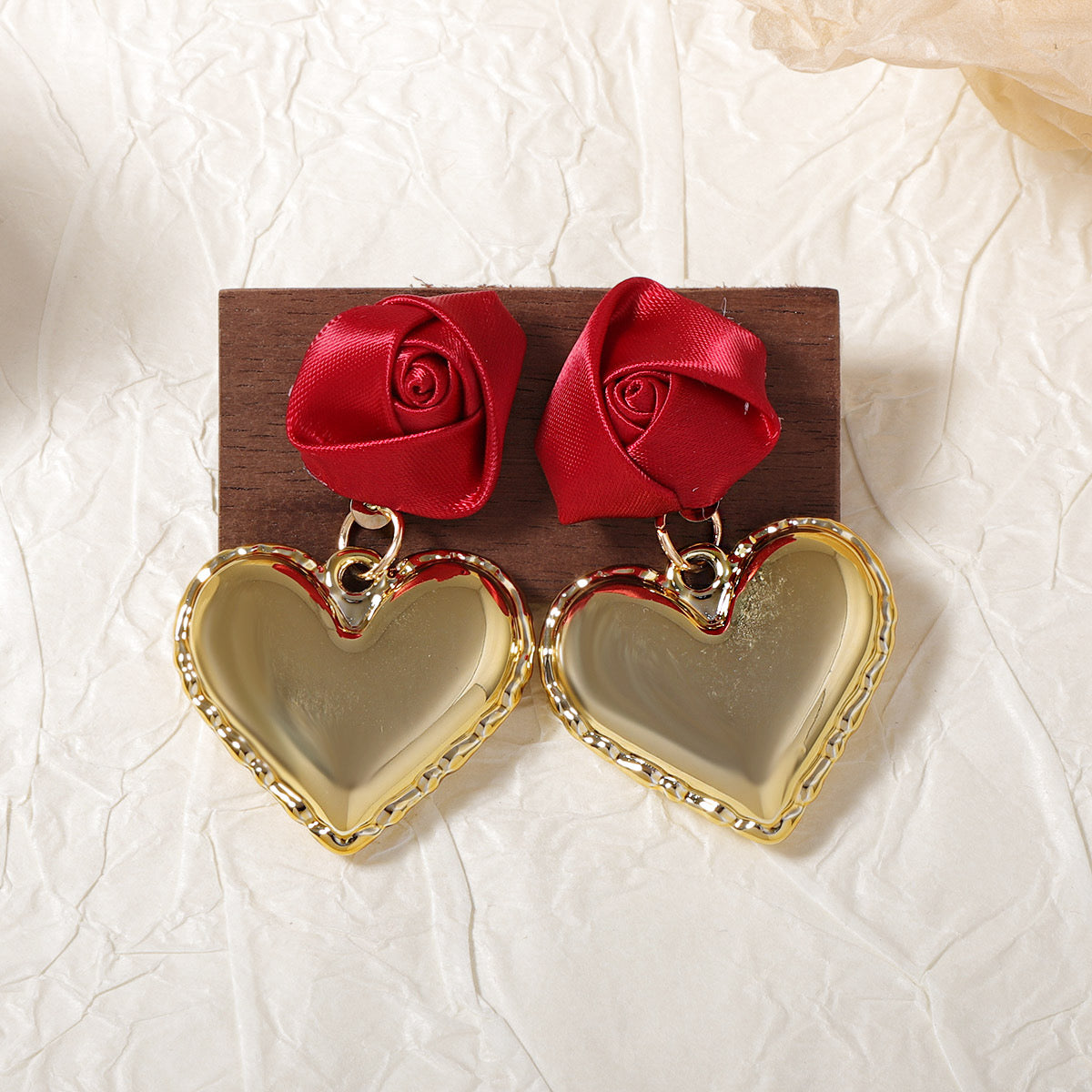 E4479 Aretes corazón dorado cobre 4.5cm