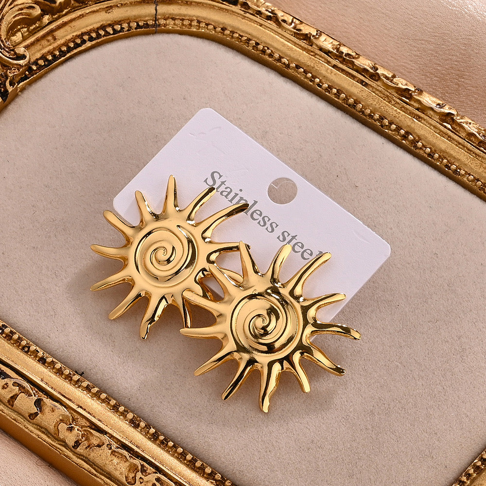 E4298 Aretes sol dorado acero inoxidable 3cm