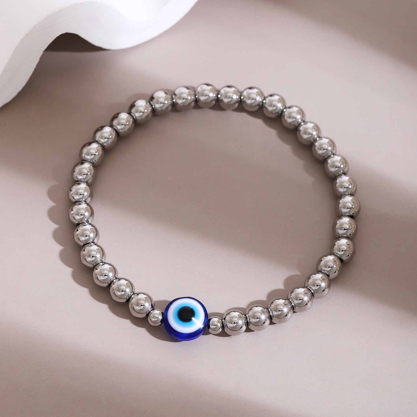 B283P Pulsera ojo turco acero inoxidable plata diametro 6cm elastica dije 1cm