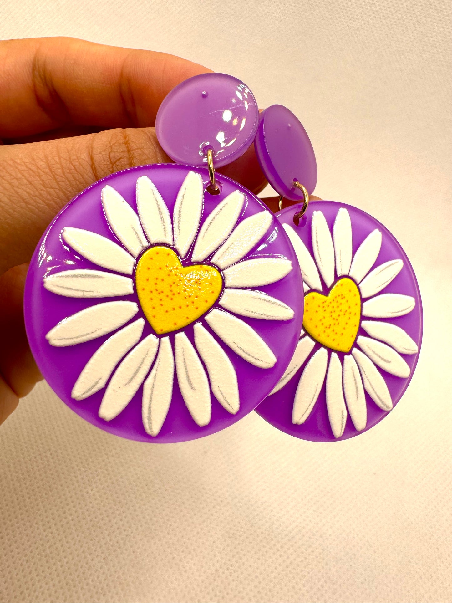 E42 Aretes Morados Girasol