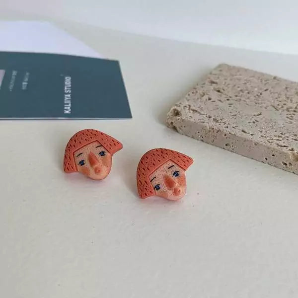Aretes 1551N Rostro Pequeño De Resina