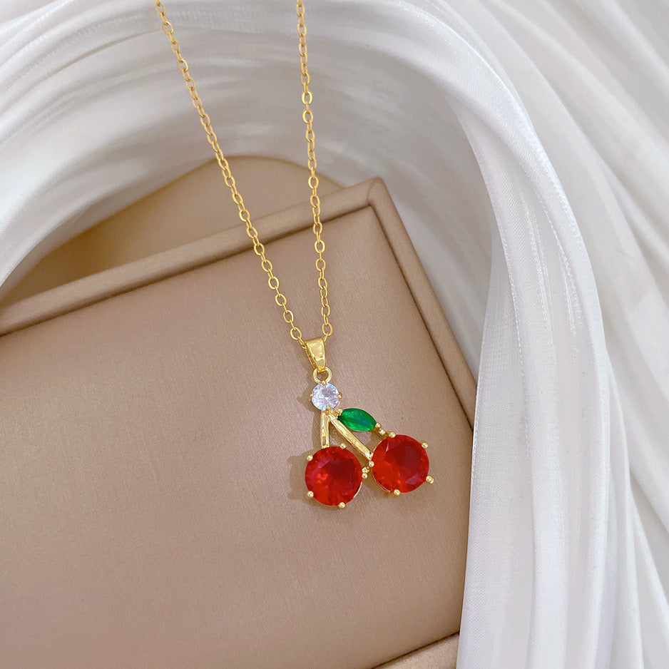 C379 Collar cereza cristal acero de titanio largo 21.5cm dije 2cm