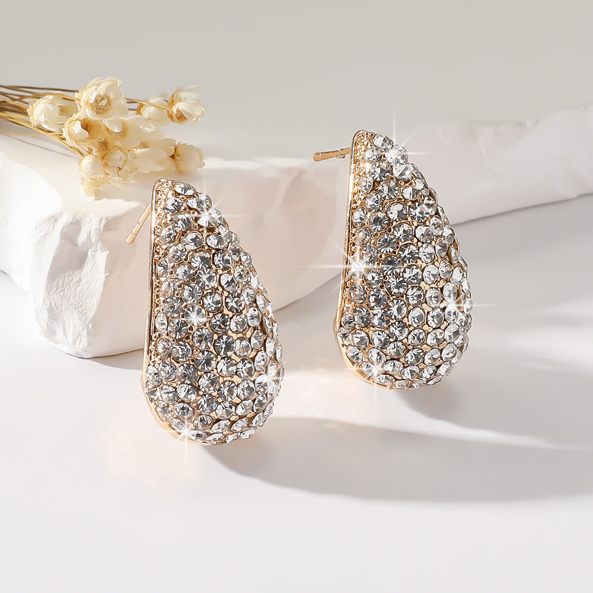 E2947 Aretes gota tipo bottega aleacion brillante 3cm