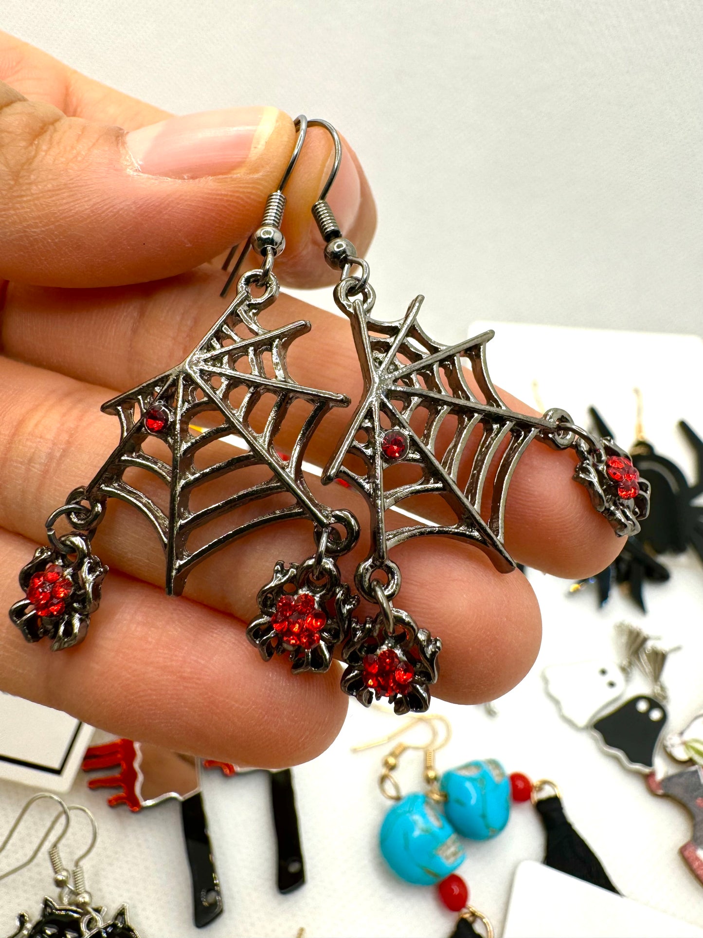 E235 Aretes telaraña metal zirconia 5cm