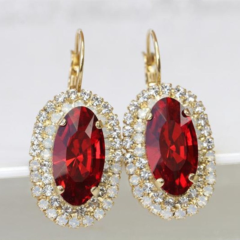 E4524 Aretes ovalo de cristal rojo brillante COB 3.5cm