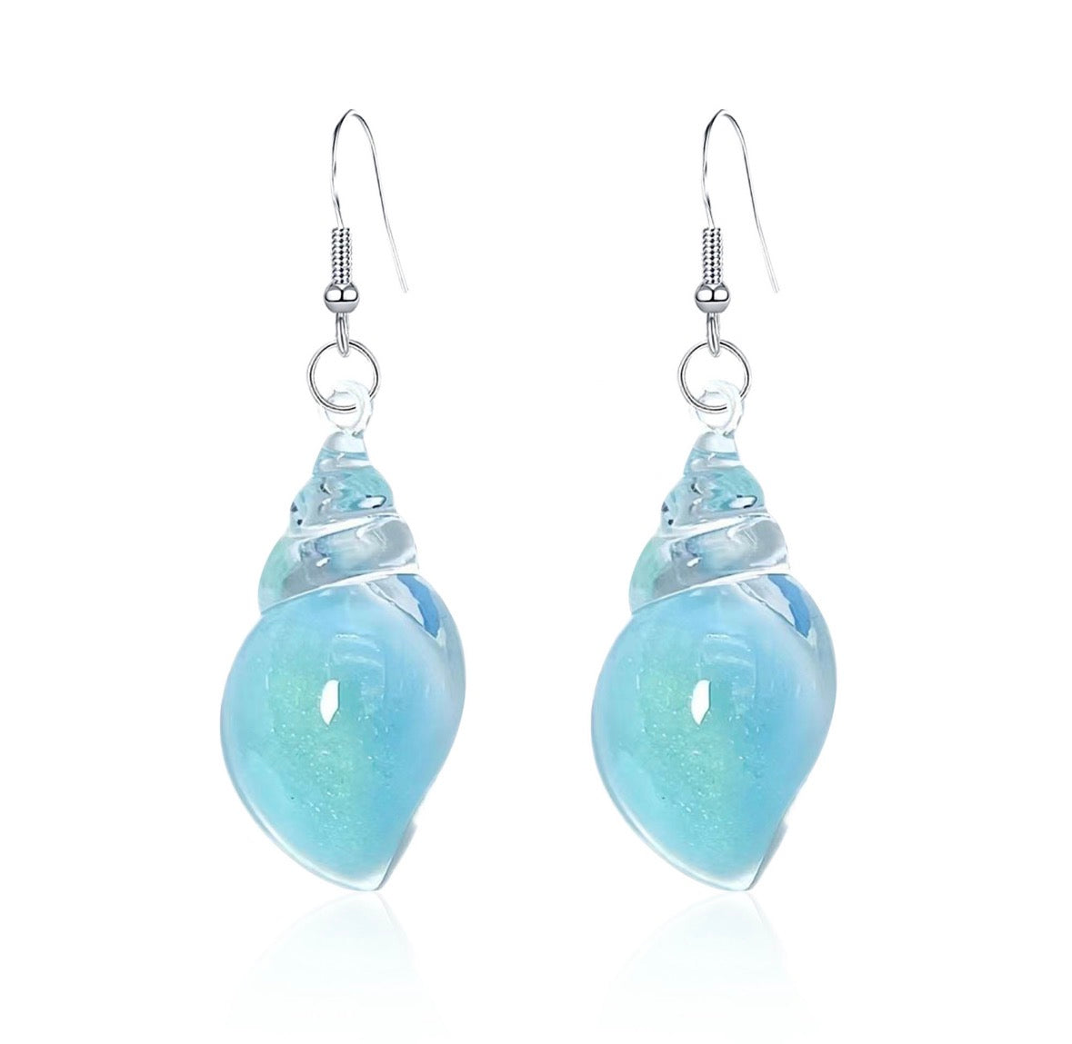 E5378 Aretes cocha de mar transparente brillante aleacion 4cm