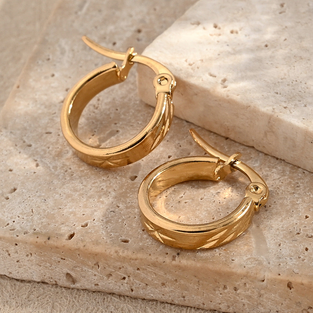 E4325 Arracadas doradas acero inoxidable 1.5cm