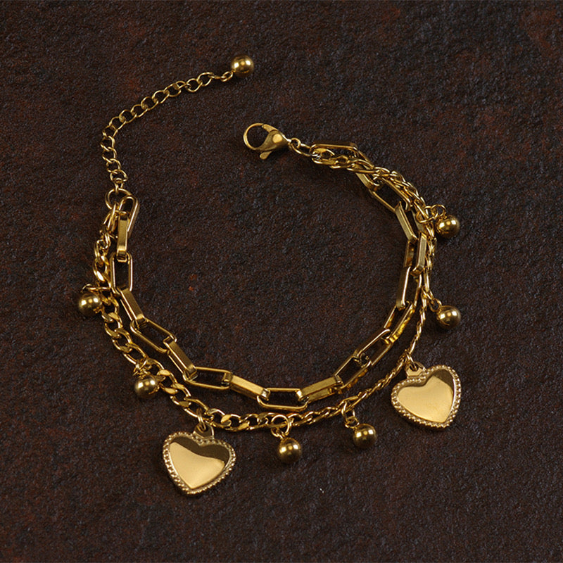 B320 Pulsera corazones acero inoxidable chapado en oro de 18k 22cm