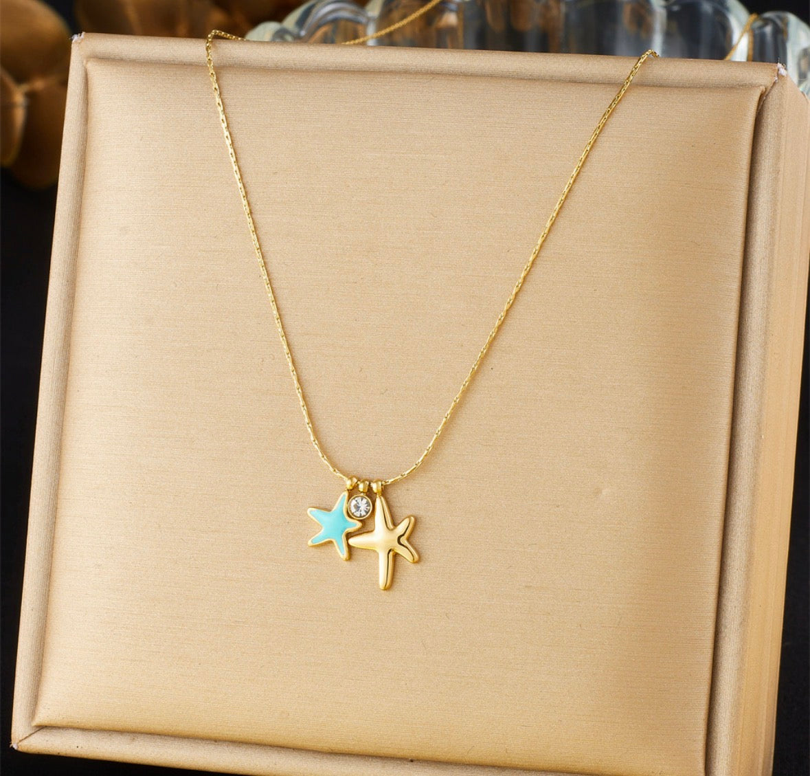 C1238 collar estrella dorada y azul acero inoxidable