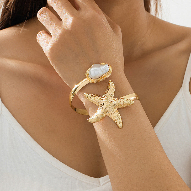 B894 Brazalete dorada estrella de mar perla aleacion abierto