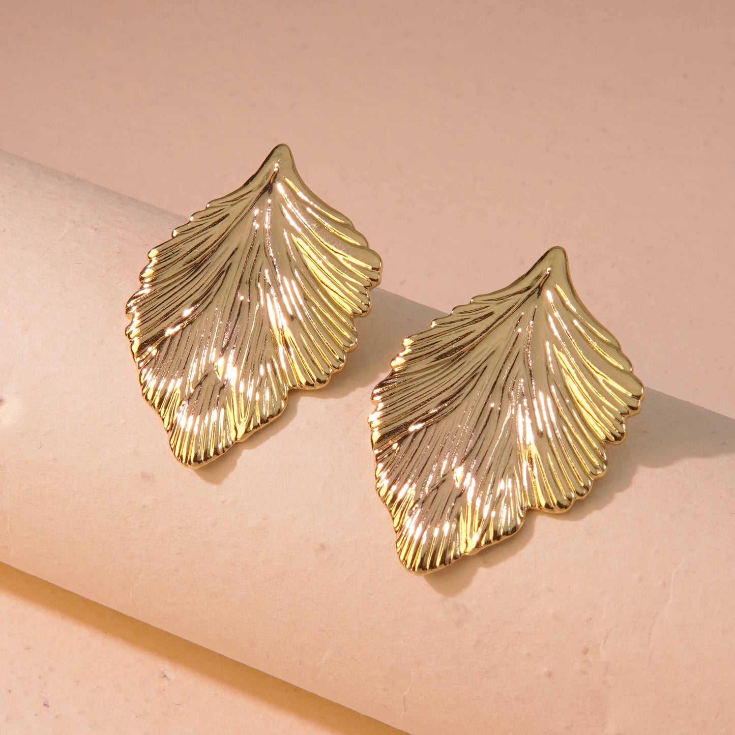 E2707 Aretes hoja acero inoxidable 3.5cm