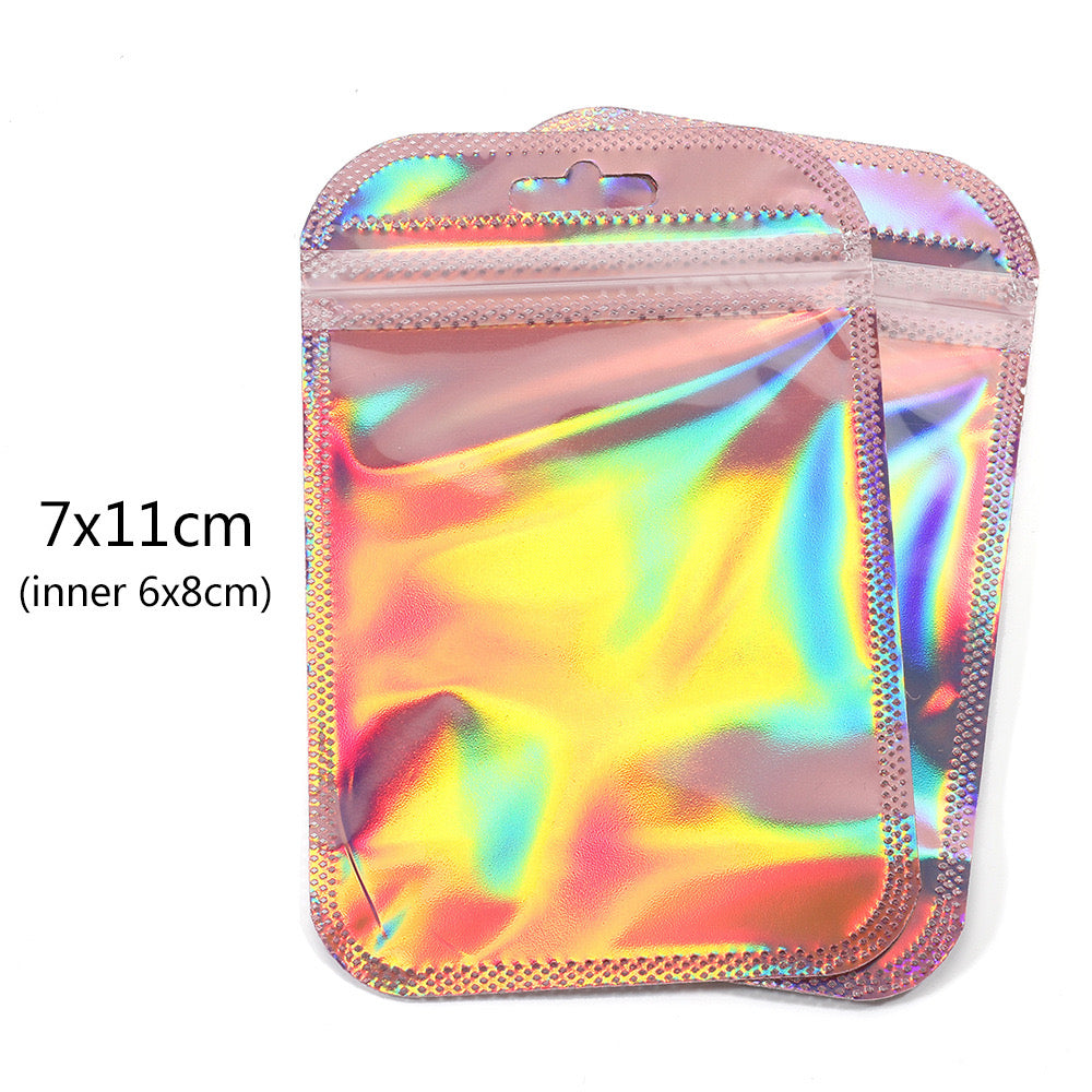 D46 Paquete incluye 50 bolsas 7x11cm arcoiris rosa
