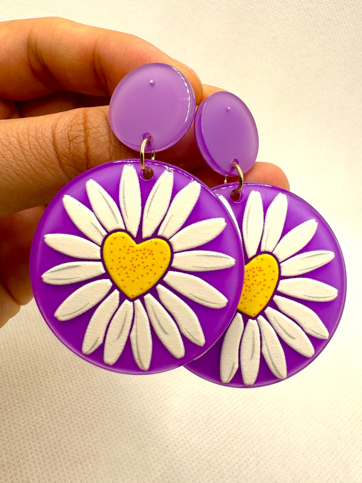E42 Aretes Morados Girasol