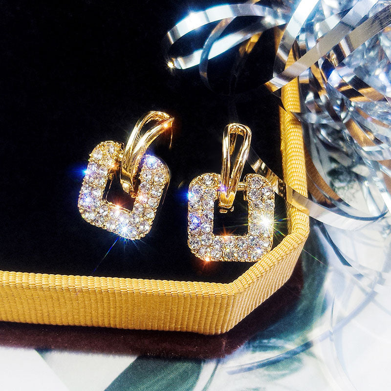 E2525 Aretes brillantes aleacion 2.5cm