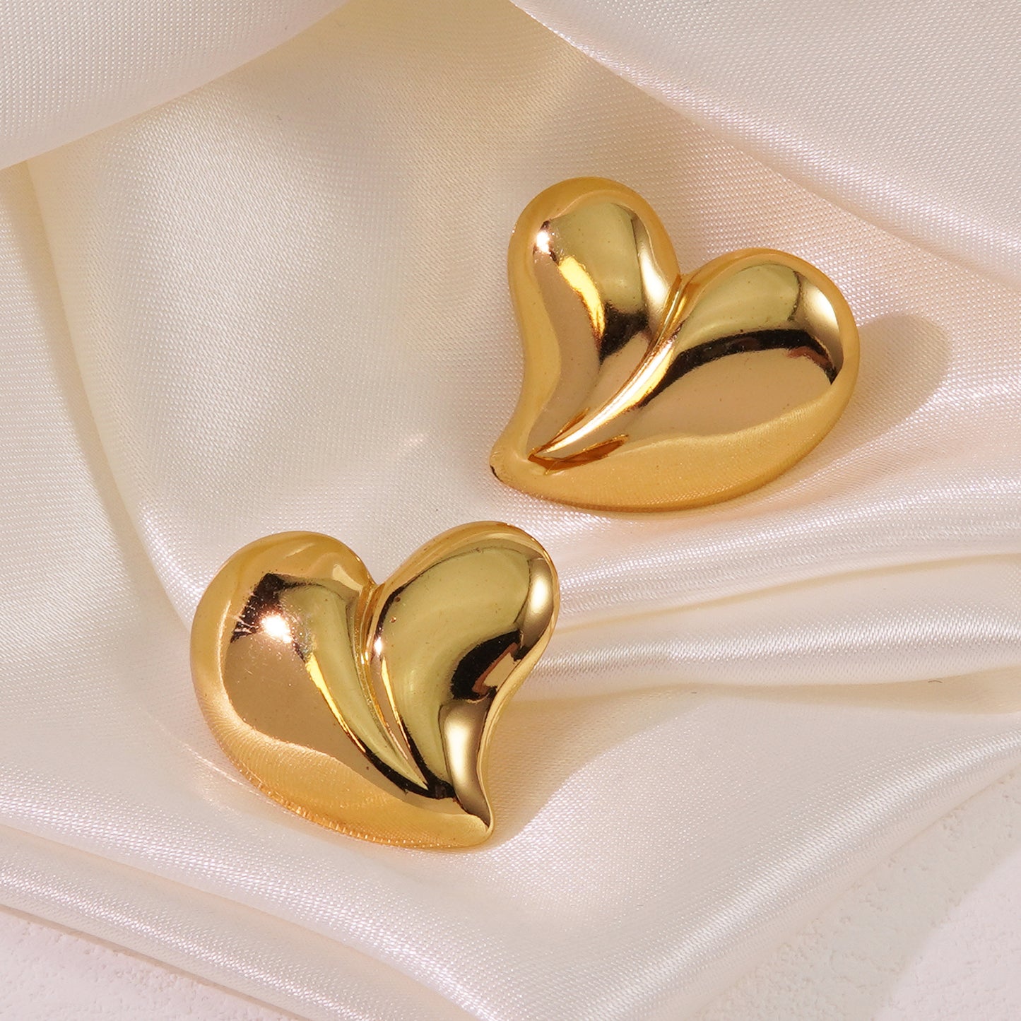 E2426 Aretes corazon acero inoxidable liso 2.3cm