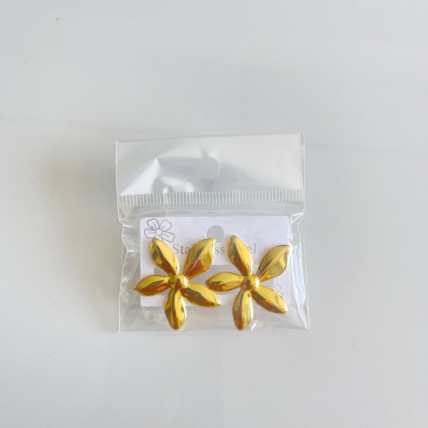E6068 Aretes flor dorada 4cm acero inoxidable