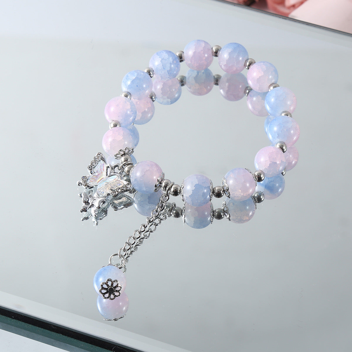 B512 Pulsera cuentas azules y rosas