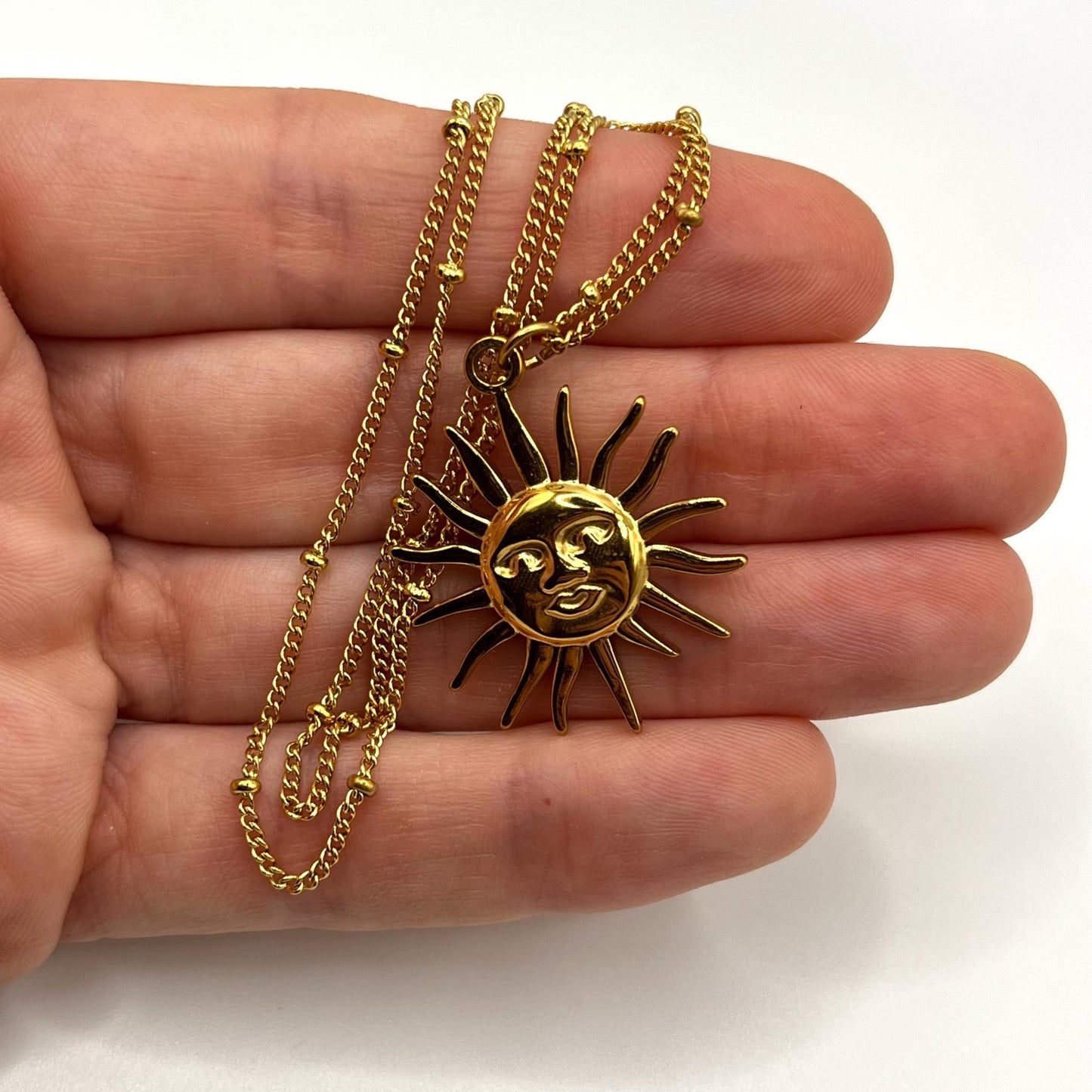 C541 Collar sol acero inoxidable chapado en oro 18k largo 26cm dije 3cm